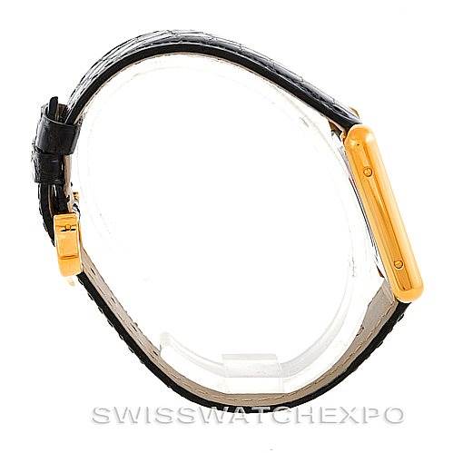 The image shows a side profile of the Cartier Tank Solo W1018755 Women's Steel and Gold (two tone) Silver Dial W1018755 Women's Steel and Gold (two tone) Silver Dial watch, highlighting its gold case and black leather strap.