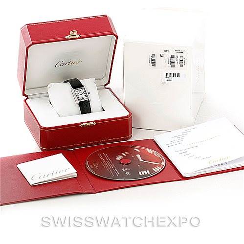 The image shows the Cartier Tank Solo W1018255 Women's Stainless Steel Silver Dial W1018255 Women's Stainless Steel Silver Dial watch in its open box, along with the manual and a CD.