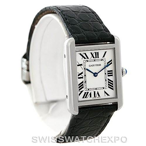 The Tank Solo model by Cartier is shown at a three-quarter angle, highlighting the face, Roman numerals, and leather strap.