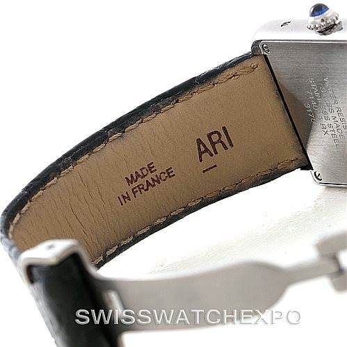 The image shows the inner leather strap with "MADE IN FRANCE," and part of the metal case and buckle of the Cartier Tank Solo W1018255 Women's Stainless Steel Silver Dial W1018255 Women's Stainless Steel Silver Dial watch.