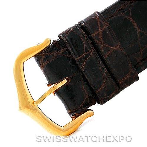 This image shows a close-up view of the leather strap and gold buckle for the Cartier Tank Solo W1018755 Women's Steel and Gold (two tone) Silver Dial W1018755 Women's Steel and Gold (two tone) Silver Dial watch.