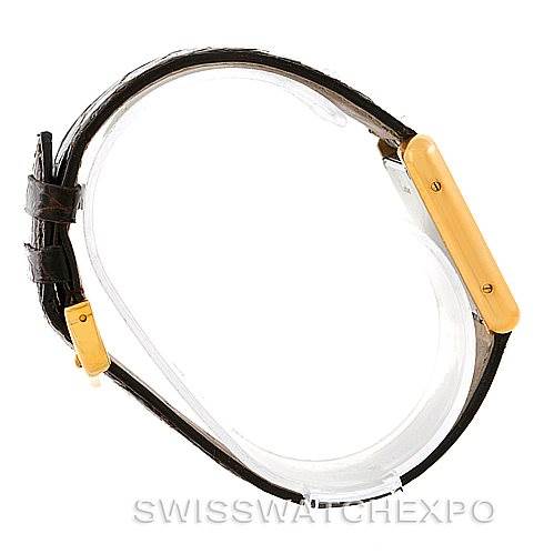 This image shows a side angle of a Cartier Tank Solo W1018755 Women's Steel and Gold (two tone) Silver Dial W1018755 Women's Steel and Gold (two tone) Silver Dial watch, highlighting the strap and gold-tone side casing.