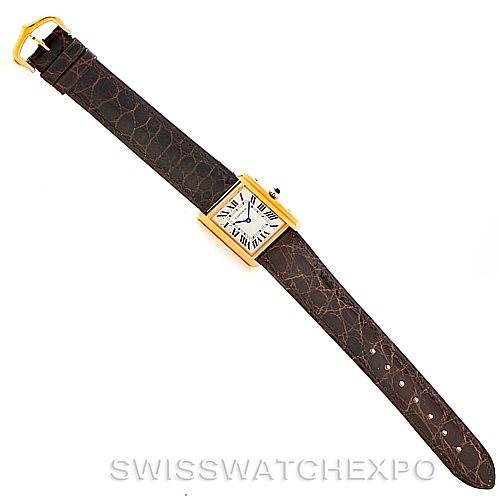 The Cartier Tank Solo W1018755 Women's Steel and Gold (two tone) Silver Dial W1018755 Women's Steel and Gold (two tone) Silver Dial watch is shown from a top-down angle, displaying its face, strap, and buckle.