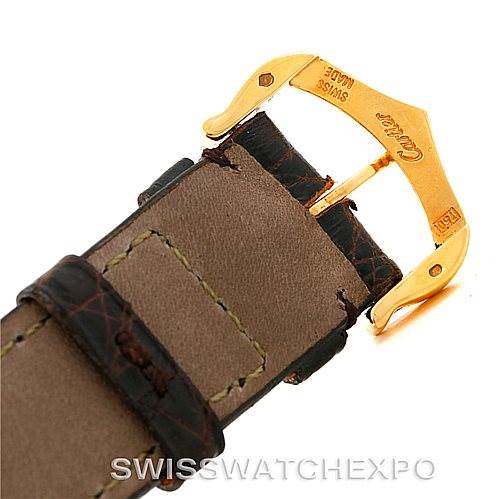 The image shows a close-up of the gold buckle and brown leather strap of a Cartier Tank Solo W1018755 Women's Steel and Gold (two tone) Silver Dial W1018755 Women's Steel and Gold (two tone) Silver Dial watch.