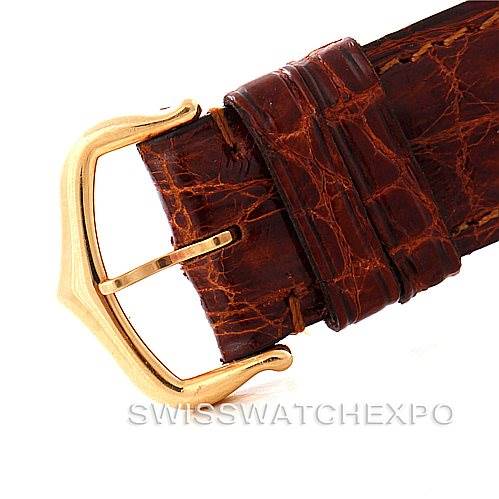 The image shows a close-up of the leather strap and gold buckle of a Cartier Tank Solo W1018755 Women's Steel and Gold (two tone) Silver Dial W1018755 Women's Steel and Gold (two tone) Silver Dial watch.