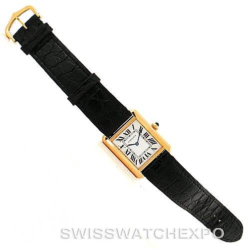 The image shows a top-down view of the Cartier Tank Solo W1018755 Women's Steel and Gold (two tone) Silver Dial W1018755 Women's Steel and Gold (two tone) Silver Dial watch, featuring its rectangular case, black leather strap, and Roman numeral dial.