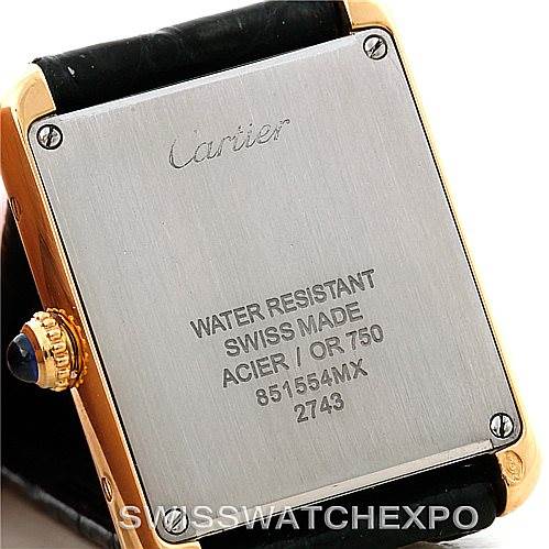 The image shows the back of a Cartier Tank Solo W1018755 Women's Steel and Gold (two tone) Silver Dial W1018755 Women's Steel and Gold (two tone) Silver Dial watch, highlighting the stainless steel case back and leather strap.