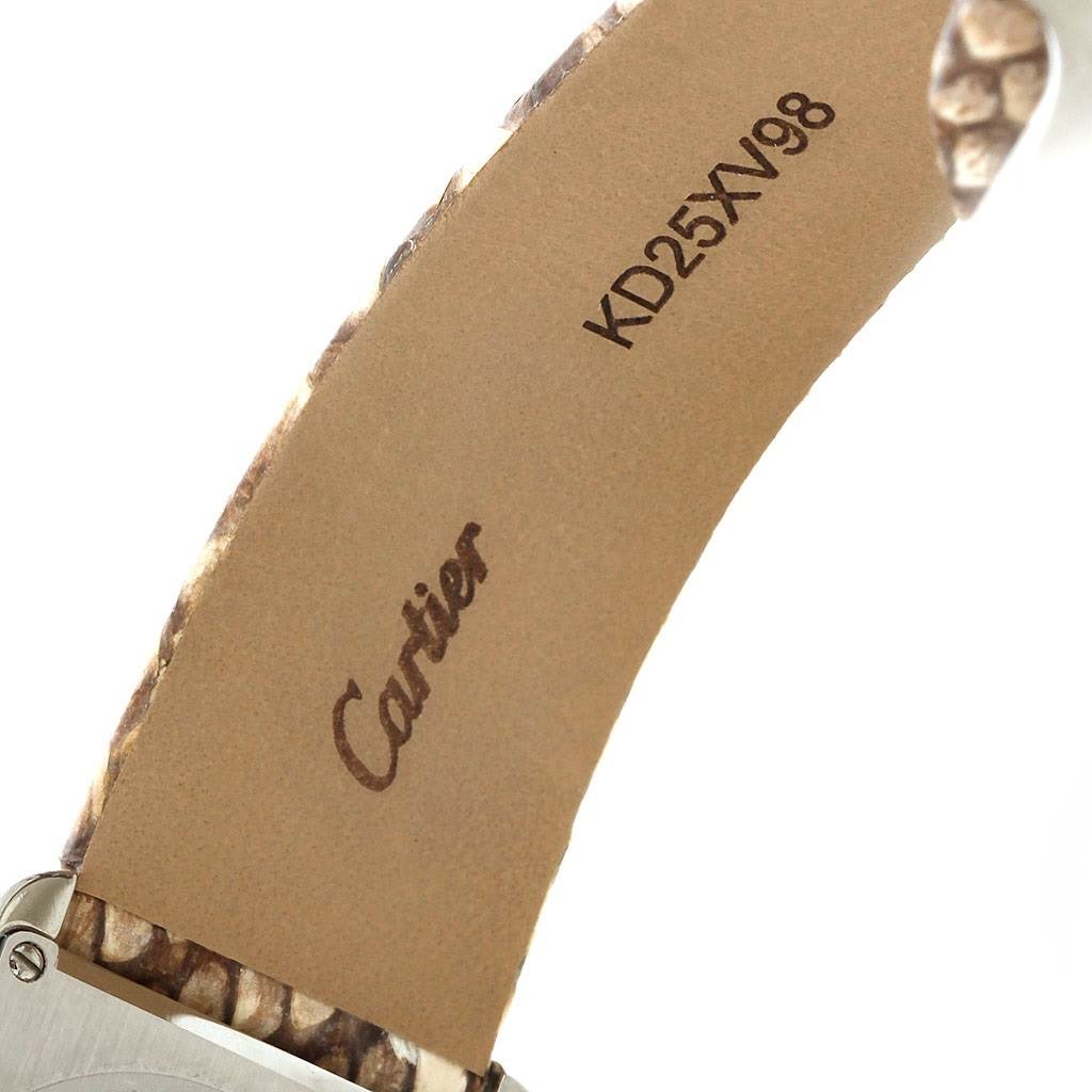 This image shows the backside of the leather strap of a Cartier Tank Solo W5200020 Women's Stainless Steel Blue Dial W5200020 Women's Stainless Steel Blue Dial watch, featuring the Cartier logo and a serial number.