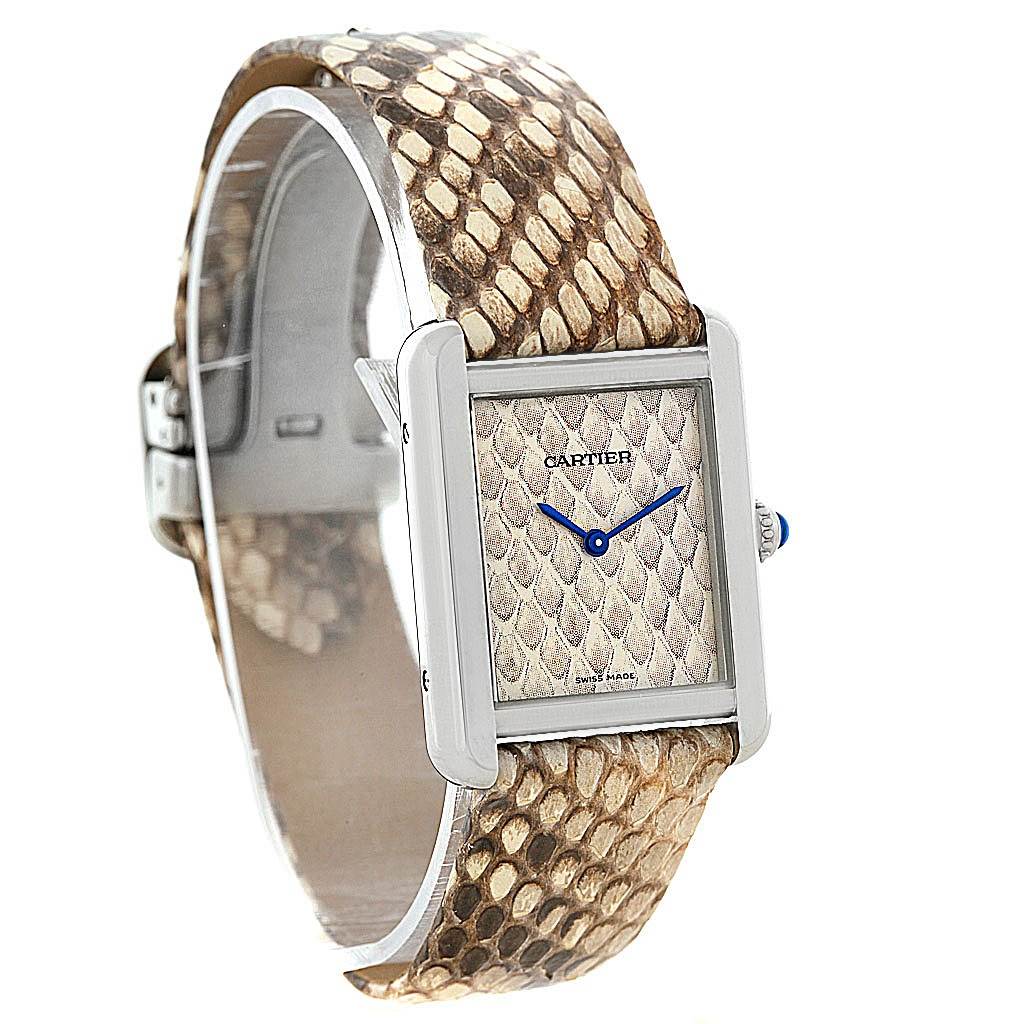 The image shows a Cartier Tank Solo W5200020 Women's Stainless Steel Blue Dial W5200020 Women's Stainless Steel Blue Dial watch viewed from an angle emphasizing the face and reptile-patterned strap.