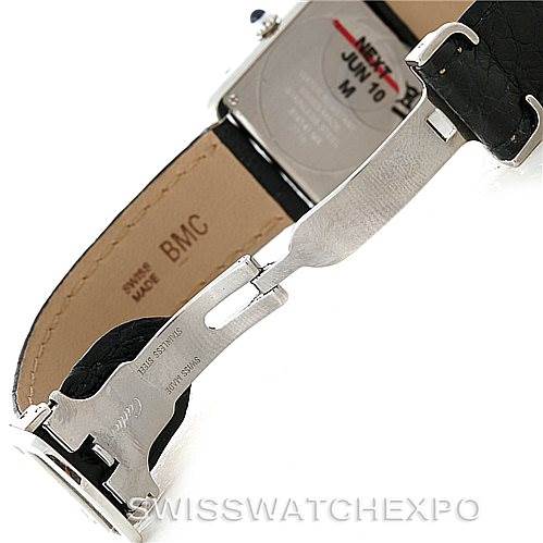 The image shows the back of a Cartier Tank Solo W1018255 Women's Stainless Steel Silver Dial W1018255 Women's Stainless Steel Silver Dial watch and its opened leather strap with a deployment buckle.