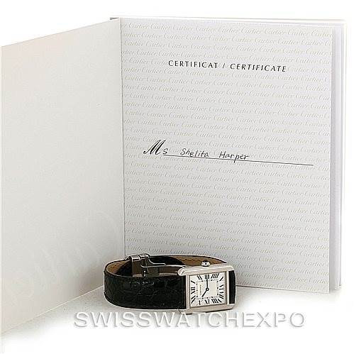 The image shows a Cartier Tank Solo W1018255 Women's Stainless Steel Silver Dial W1018255 Women's Stainless Steel Silver Dial watch with a black strap, displayed alongside its certificate.