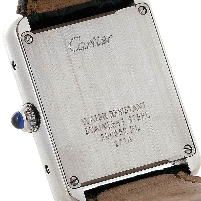 The image shows the back view of a Cartier Tank Solo W1018255 Women's Stainless Steel Silver Dial W1018255 Women's Stainless Steel Silver Dial watch, displaying its stainless steel case and water resistance details.