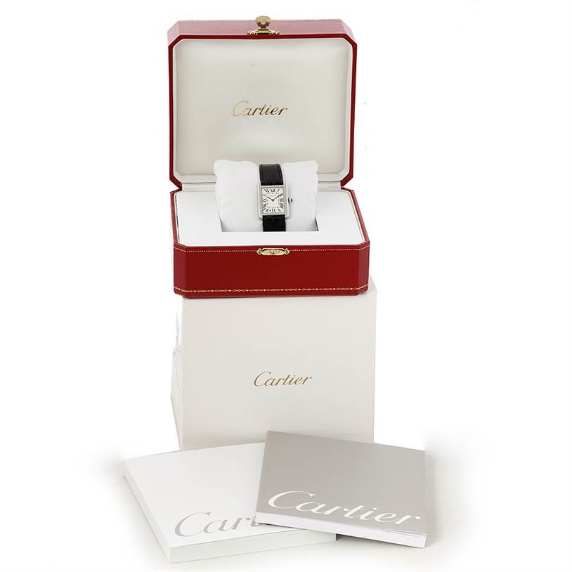 The image shows a Cartier Tank Solo W1018255 Women's Stainless Steel Silver Dial W1018255 Women's Stainless Steel Silver Dial watch in an open red box, with additional boxes and booklets displayed.