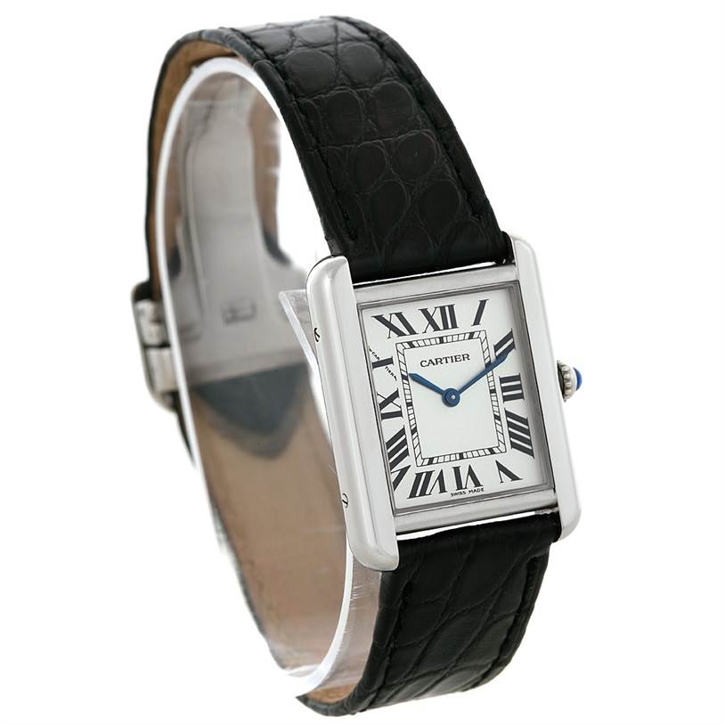 The image shows a Cartier Tank Solo W1018255 Women's Stainless Steel Silver Dial W1018255 Women's Stainless Steel Silver Dial watch from an angled side view, highlighting its face, Roman numerals, and black leather strap.