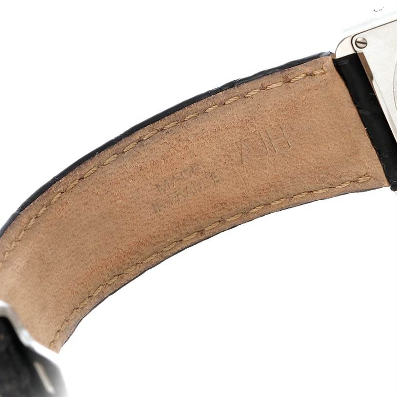 The image shows the inner side of the leather strap and part of the case back of the Cartier Tank Solo W1018255 Women's Stainless Steel Silver Dial W1018255 Women's Stainless Steel Silver Dial model watch.