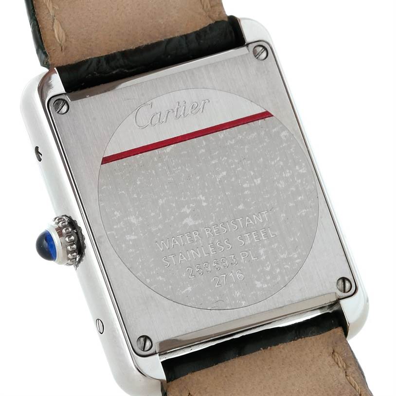 The image shows the back of a Cartier Tank Solo W1018255 Women's Stainless Steel Silver Dial W1018255 Women's Stainless Steel Silver Dial watch, highlighting the case, strap attachment, and crown with a blue cabochon.