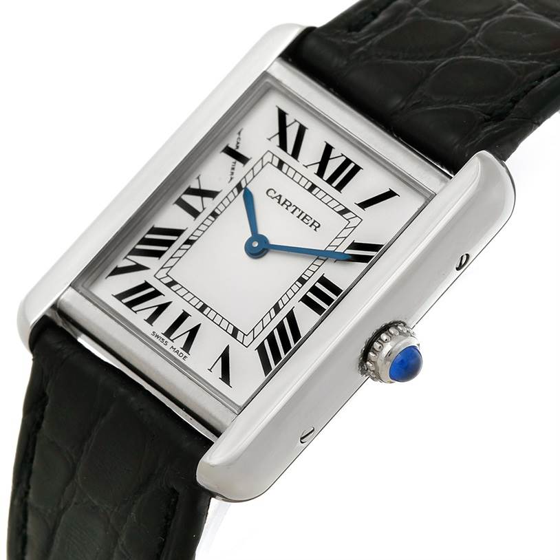 The Cartier Tank Solo W1018255 Women's Stainless Steel Silver Dial W1018255 Women's Stainless Steel Silver Dial watch is shown at a slight angle, displaying its face, crown, and leather strap.