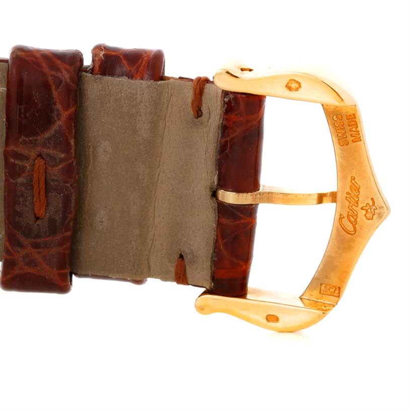 The image shows a close-up of the brown leather strap and gold buckle of a Cartier Tank Solo W1018755 Women's Steel and Gold (two tone) Silver Dial W1018755 Women's Steel and Gold (two tone) Silver Dial watch.