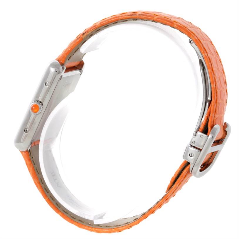 The image shows a side view of the Cartier Tank Solo W1019455 Women's Stainless Steel Orange Dial W1019455 Women's Stainless Steel Orange Dial watch, highlighting its orange leather strap and metallic case with a crown.