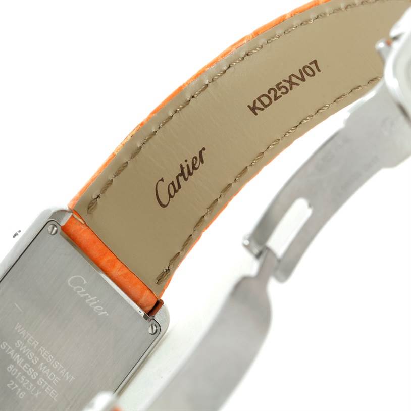 The image shows the back of the Cartier Tank Solo W1019455 Women's Stainless Steel Orange Dial W1019455 Women's Stainless Steel Orange Dial watch and part of its orange leather strap.