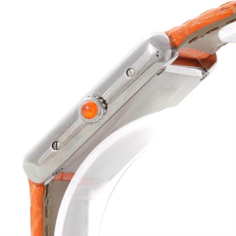 The image shows a side view of a Cartier Tank Solo W1019455 Women's Stainless Steel Orange Dial W1019455 Women's Stainless Steel Orange Dial watch, highlighting its crown and part of the orange strap.