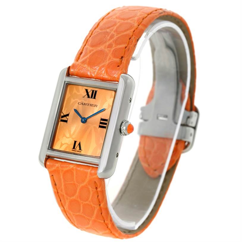 This image shows a Cartier Tank Solo W1019455 Women's Stainless Steel Orange Dial W1019455 Women's Stainless Steel Orange Dial watch with an orange leather strap, facing at a three-quarter angle.