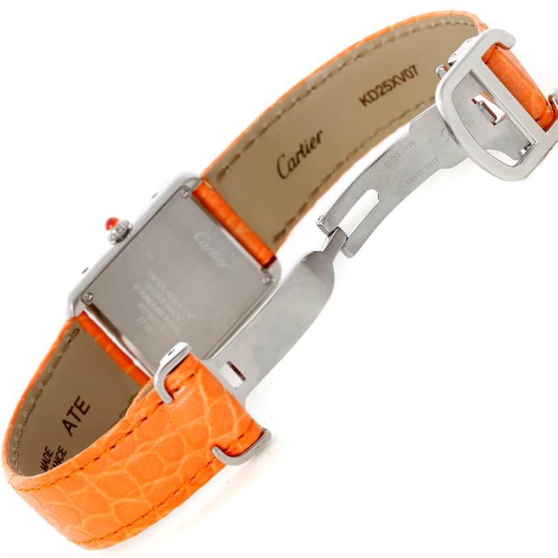 The image shows the back and strap of a Cartier Tank Solo W1019455 Women's Stainless Steel Orange Dial W1019455 Women's Stainless Steel Orange Dial watch, highlighting the orange leather strap and stainless steel clasp.