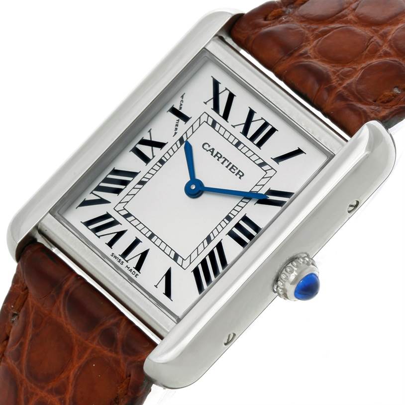 The image shows a close-up, angled view of the Cartier Tank Solo W1018255 Women's Stainless Steel Silver Dial W1018255 Women's Stainless Steel Silver Dial watch face and part of the leather strap.