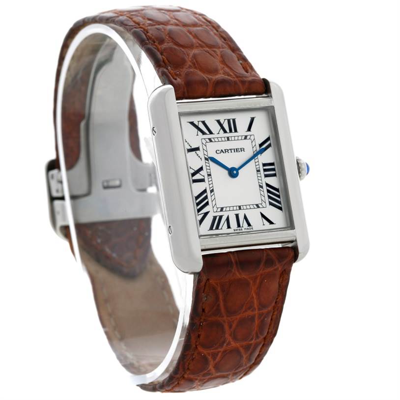 The image shows a Tank Solo model by Cartier from a 3/4 front angle, highlighting the face, case, and brown leather strap.