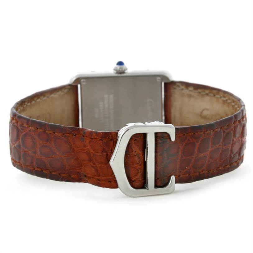 The image shows the back view of the Cartier Tank Solo W1018255 Women's Stainless Steel Silver Dial W1018255 Women's Stainless Steel Silver Dial watch, highlighting the brown leather strap and clasp with the "C" logo.