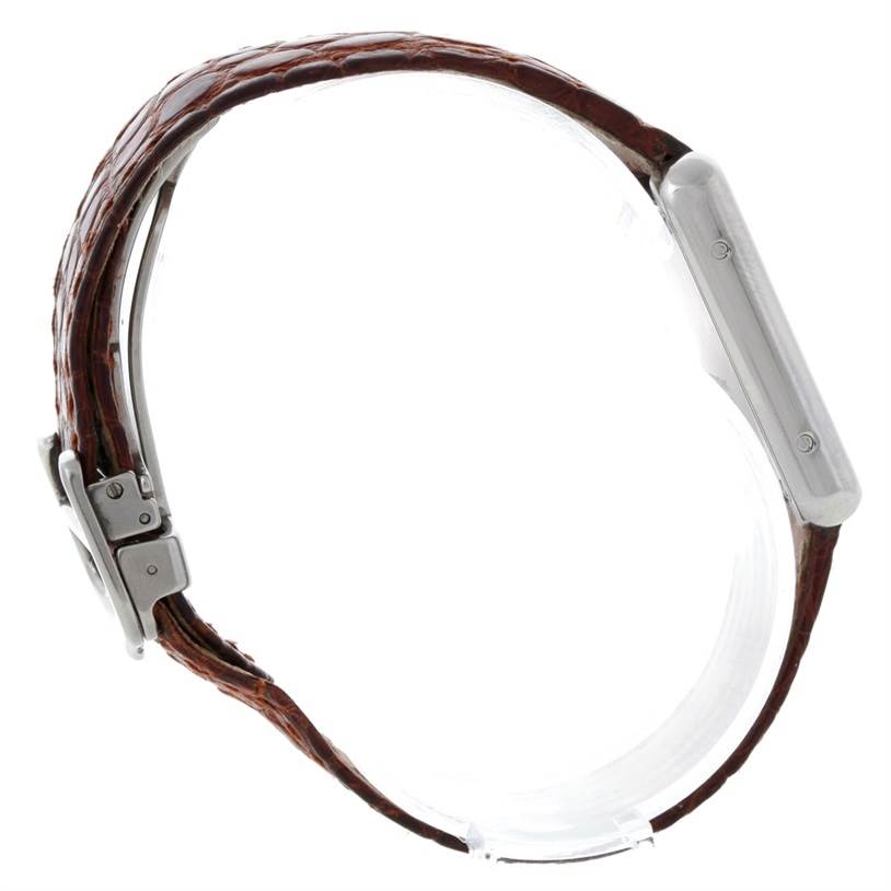 The image shows the side profile of a Cartier Tank Solo W1018255 Women's Stainless Steel Silver Dial W1018255 Women's Stainless Steel Silver Dial watch with a visible leather strap and stainless steel buckle.