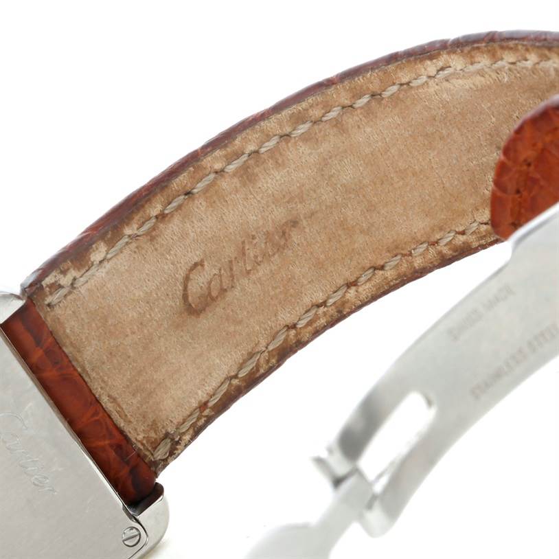 This image shows the underside of the leather strap of a Cartier Tank Solo W1018255 Women's Stainless Steel Silver Dial W1018255 Women's Stainless Steel Silver Dial watch, highlighting the brand engraving.