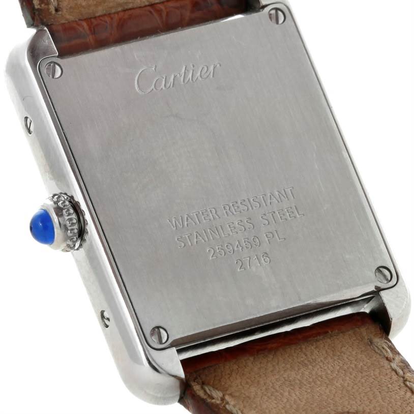 The image shows the back of a Cartier Tank Solo W1018255 Women's Stainless Steel Silver Dial W1018255 Women's Stainless Steel Silver Dial watch, highlighting its stainless steel case and leather strap.