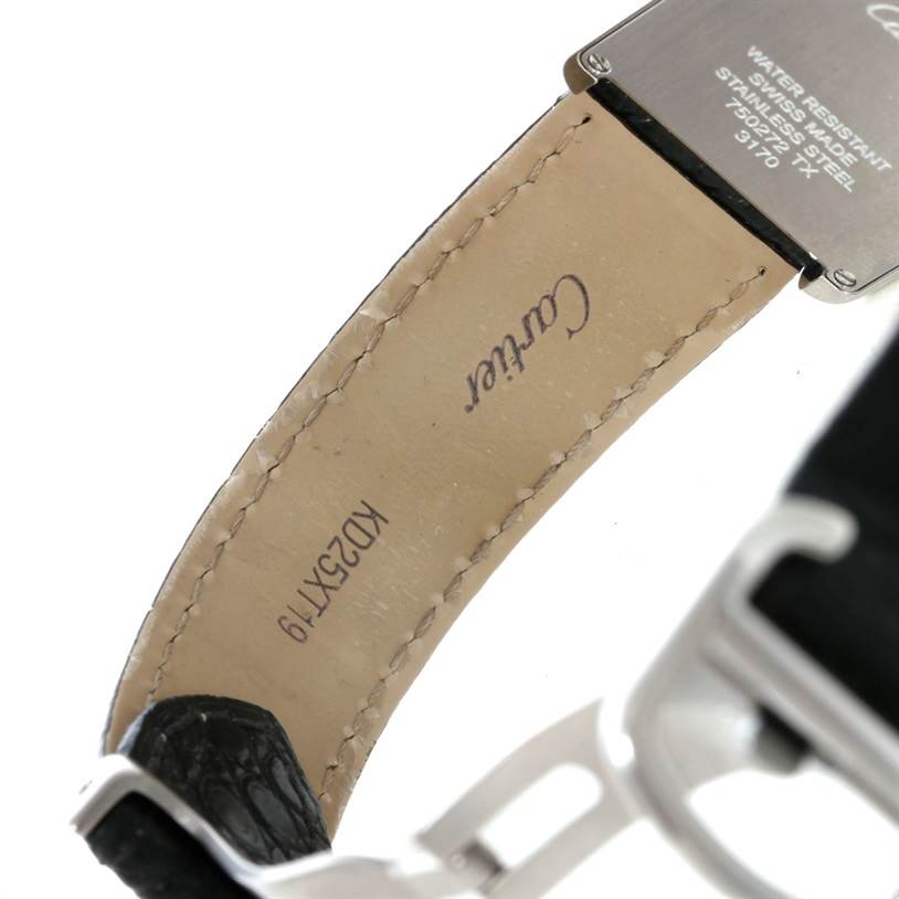 The image shows the underside of a Cartier Tank Solo W1018255 Women's Stainless Steel Silver Dial W1018255 Women's Stainless Steel Silver Dial watch strap and part of the watch case back plate at an angled close-up.