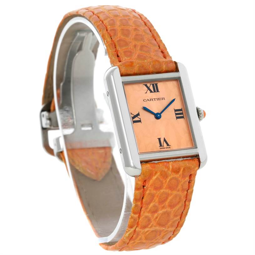 The Cartier Tank Solo W1019455 Women's Stainless Steel Orange Dial W1019455 Women's Stainless Steel Orange Dial watch is shown at a three-quarter angle, highlighting its orange strap, rectangular dial, and Roman numerals.