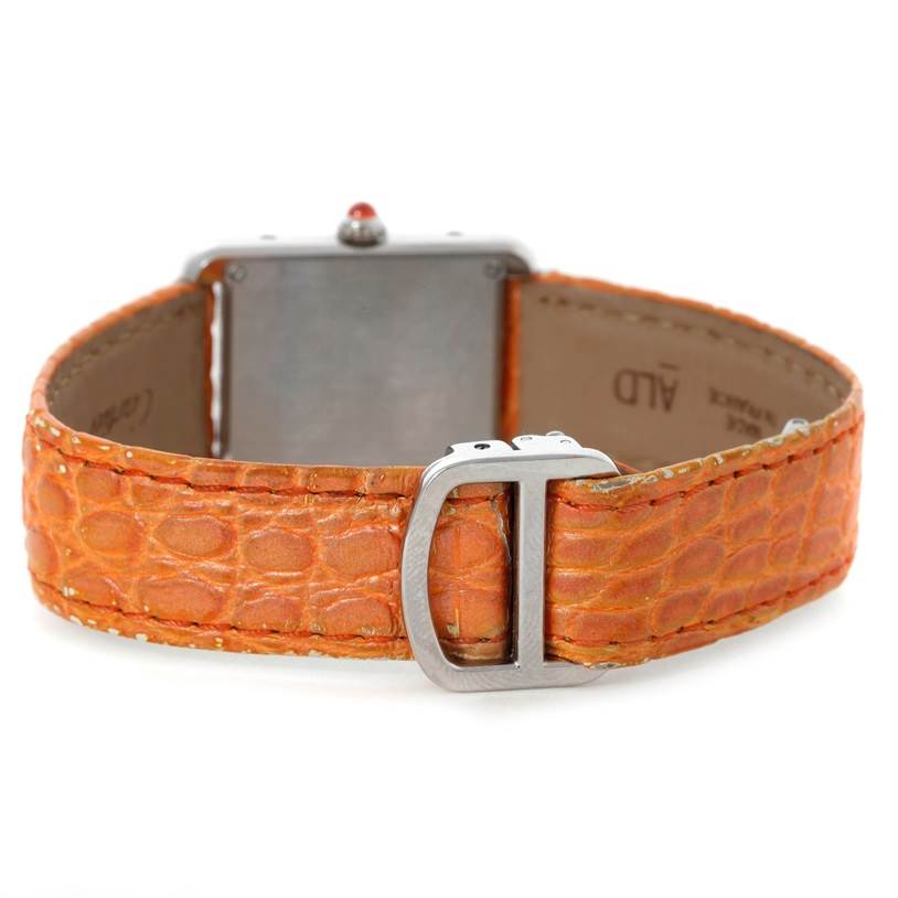 This image shows the back view of the Cartier Tank Solo W1019455 Women's Stainless Steel Orange Dial W1019455 Women's Stainless Steel Orange Dial watch featuring its case back and orange leather strap.