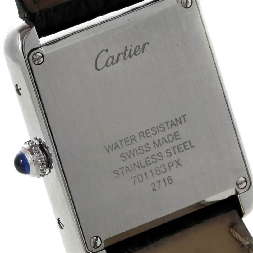 This image shows the back and side of the Cartier Tank Solo W1018255 Women's Stainless Steel Silver Dial W1018255 Women's Stainless Steel Silver Dial watch, highlighting the crown and stainless steel case with engravings.