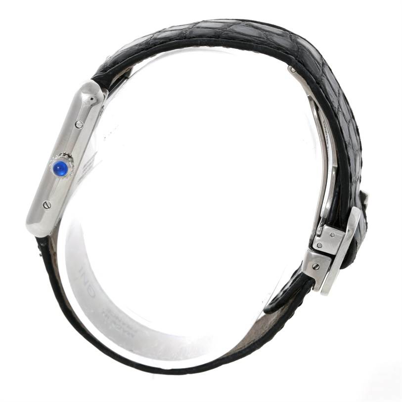 This image shows a Cartier Tank Solo W1018255 Women's Stainless Steel Silver Dial W1018255 Women's Stainless Steel Silver Dial watch from a side angle, highlighting the crown, case, and black leather strap.