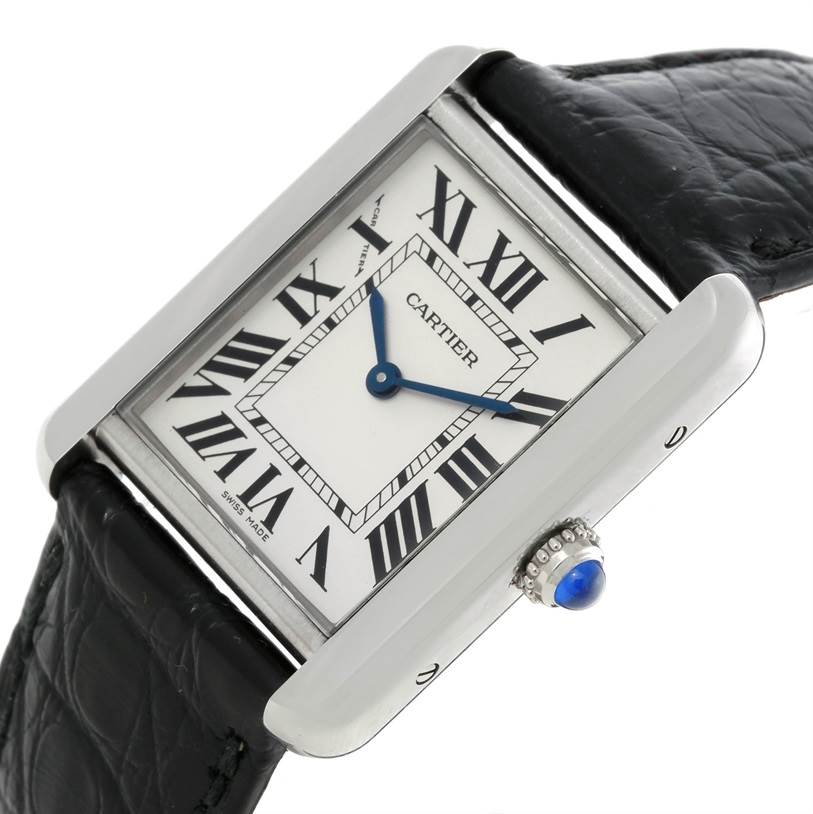 The image shows a Cartier Tank Solo W1018255 Women's Stainless Steel Silver Dial W1018255 Women's Stainless Steel Silver Dial watch from a slightly tilted angle, highlighting its face, side, and crown with a blue cabochon.