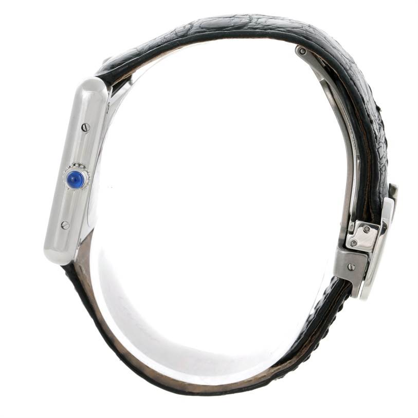 The image shows a side view of the Cartier Tank Solo W1018255 Women's Stainless Steel Silver Dial W1018255 Women's Stainless Steel Silver Dial watch, focusing on the crown and part of the black leather strap.