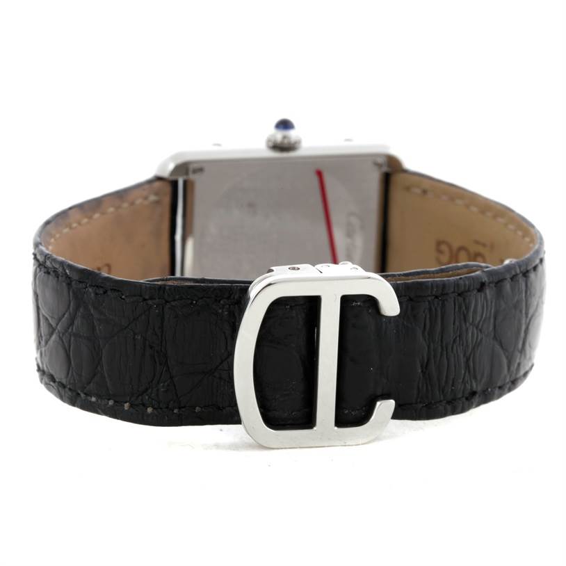 The image shows the back of a Cartier Tank Solo W1018255 Women's Stainless Steel Silver Dial W1018255 Women's Stainless Steel Silver Dial watch focusing on its black leather strap and clasp.