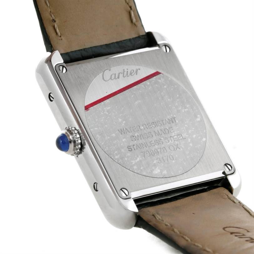 The image shows the back side of a Cartier Tank Solo W1018255 Women's Stainless Steel Silver Dial W1018255 Women's Stainless Steel Silver Dial watch, highlighting the leather strap and the stainless steel case back.