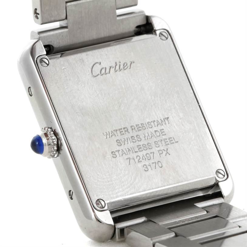 The image shows the back of a Cartier Tank Solo W5200013 Women's Stainless Steel Silver Dial W5200013 Women's Stainless Steel Silver Dial watch, highlighting its stainless steel case, engravings, and part of the bracelet.