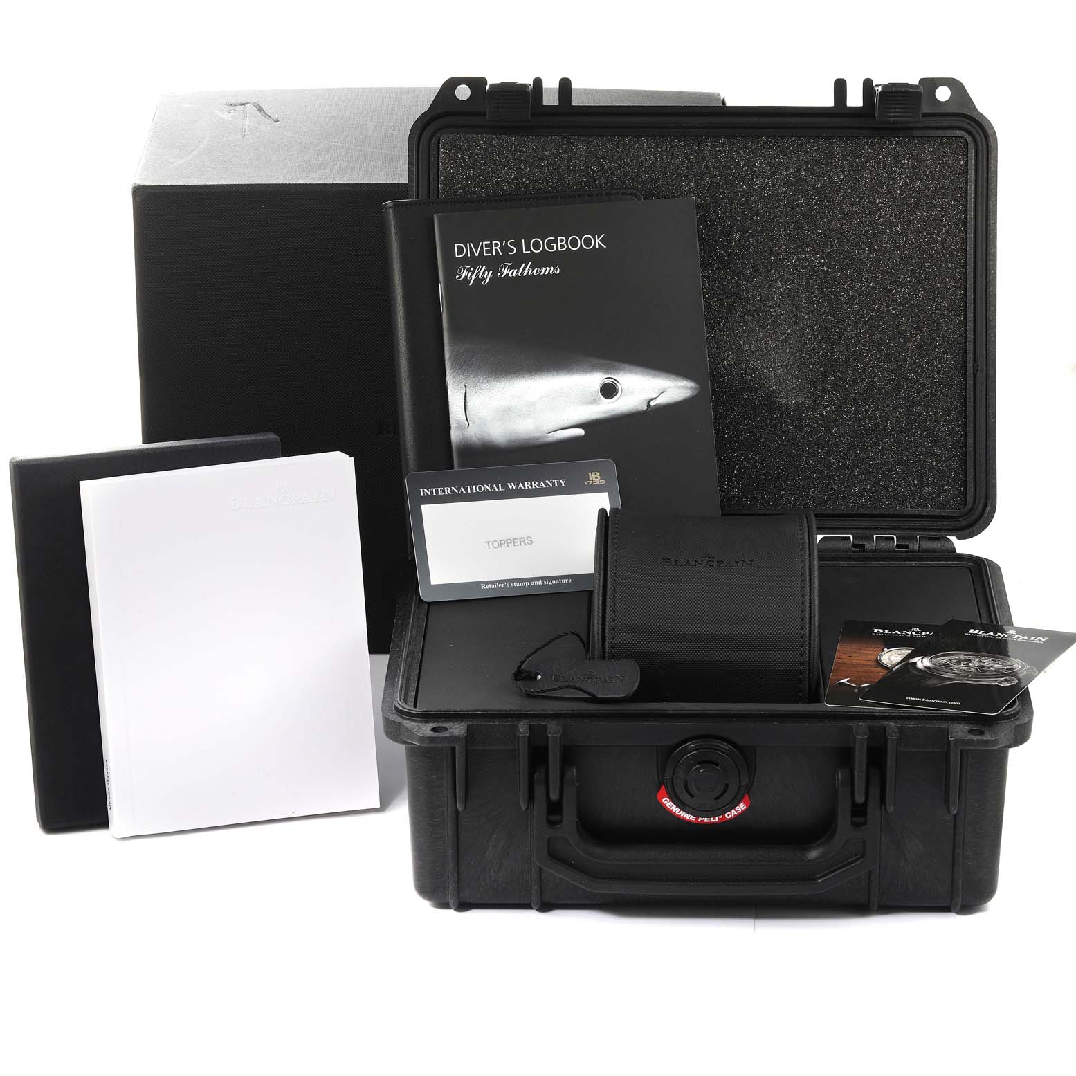 The image shows a Blancpain Fifty Fathoms 5000-0240-052A Men's Ceramic Blue Dial 5000-0240-052A Men's Ceramic Blue Dial watch package, including a diver's logbook, warranty cards, and a carrying case.