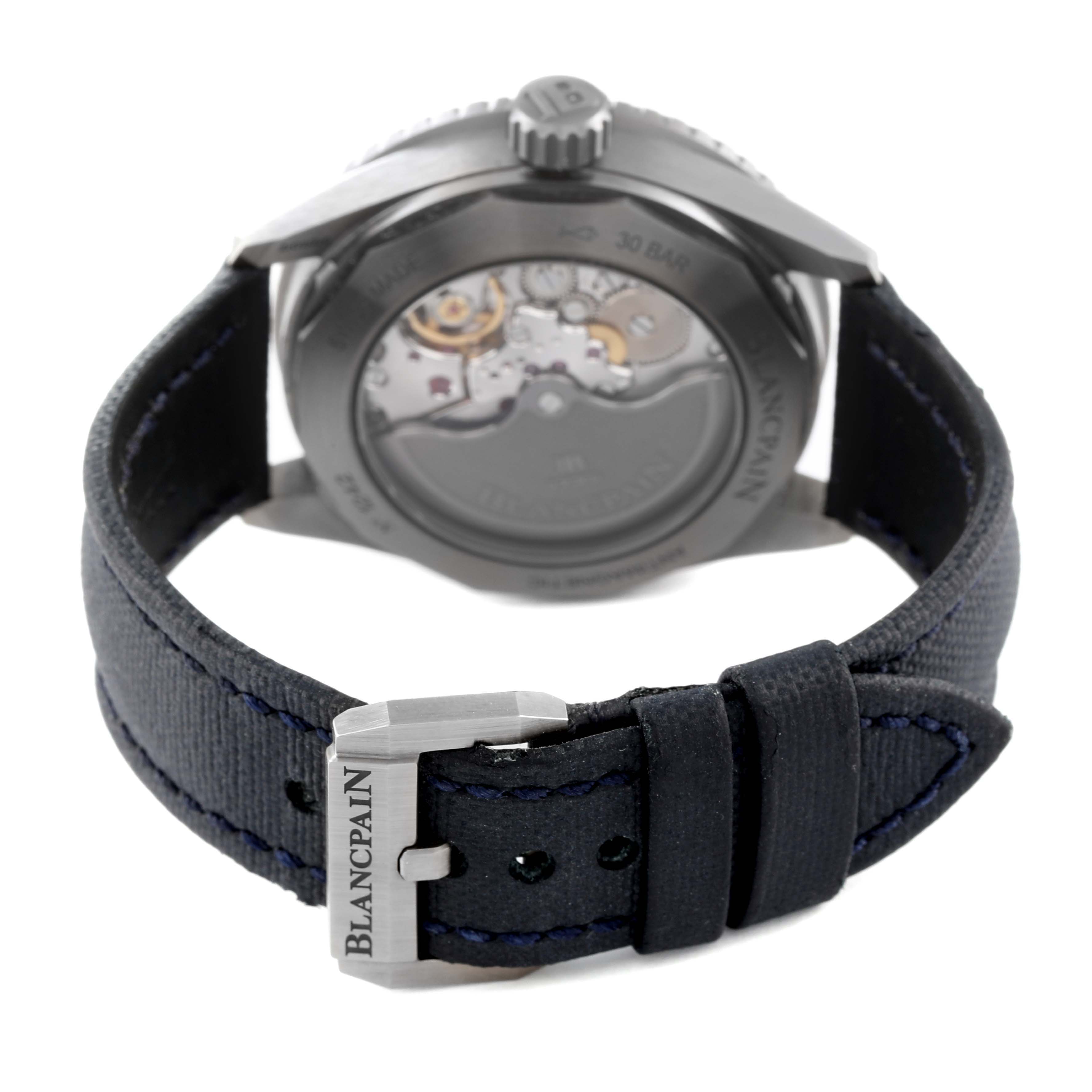 This image shows the back view of a Blancpain Fifty Fathoms 5000-0240-052A Men's Ceramic Blue Dial 5000-0240-052A Men's Ceramic Blue Dial watch, including the movement and strap with the Blancpain buckle.