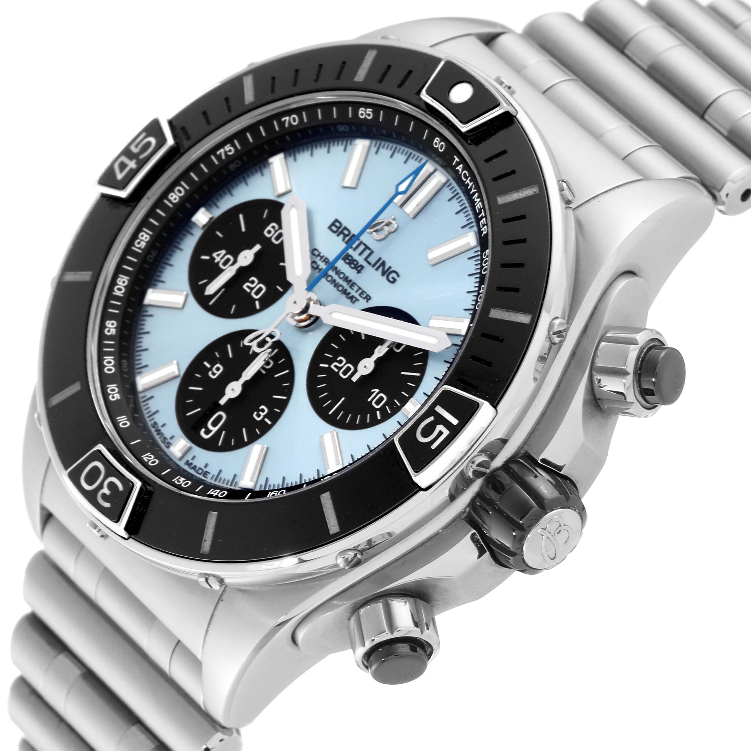 This is a side-angle view of the Breitling Chronomat PB0136 Men's Stainless Steel Blue Dial PB0136 Men's Stainless Steel Blue Dial watch, showing the face, crown, pushers, and part of the linked bracelet.