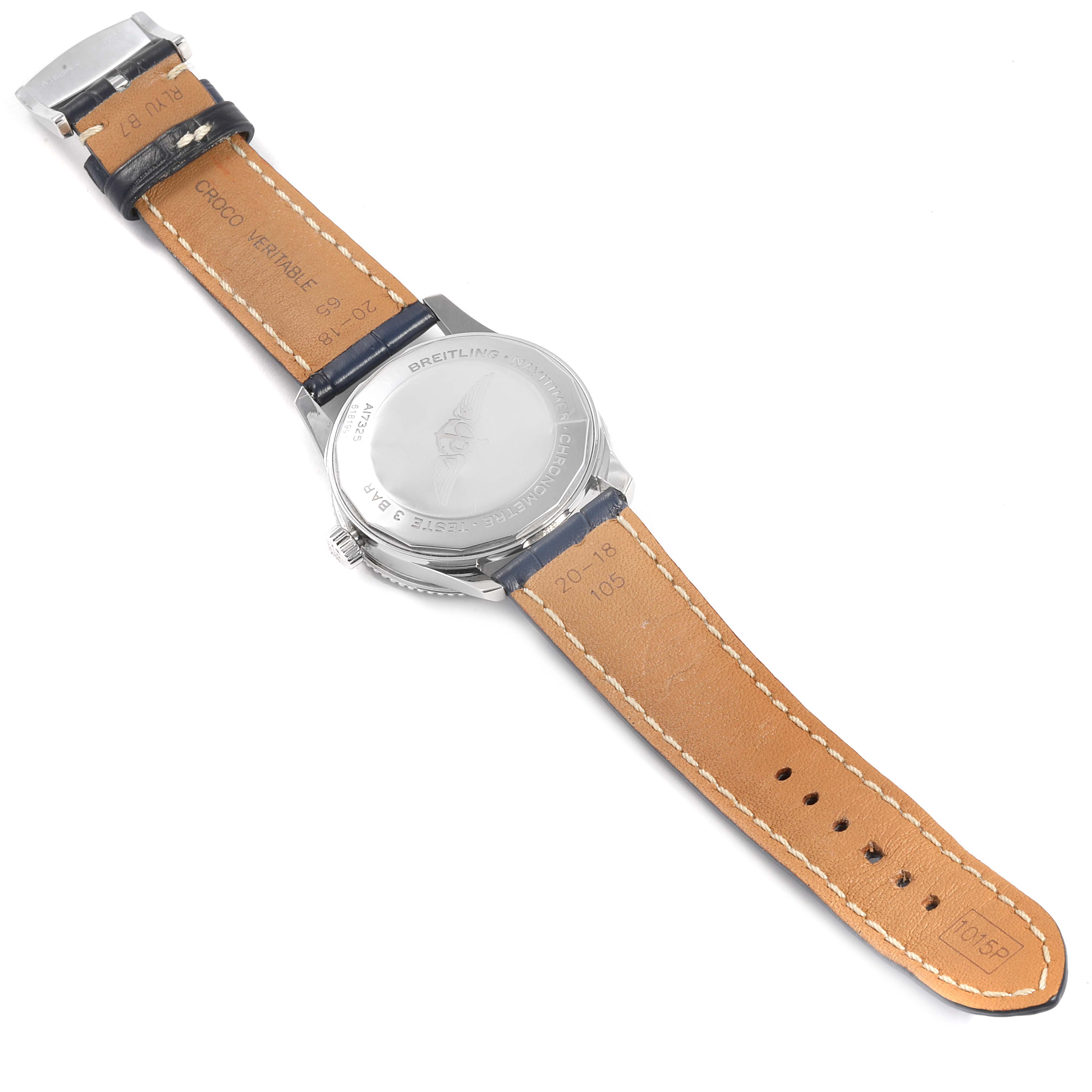 The image shows the back of a Breitling Navitimer A17325 Men
s Stainless Steel Blue Dial A17325 Men
s Stainless Steel Blue Dial watch, displaying the case back and the inner side of the leather strap.