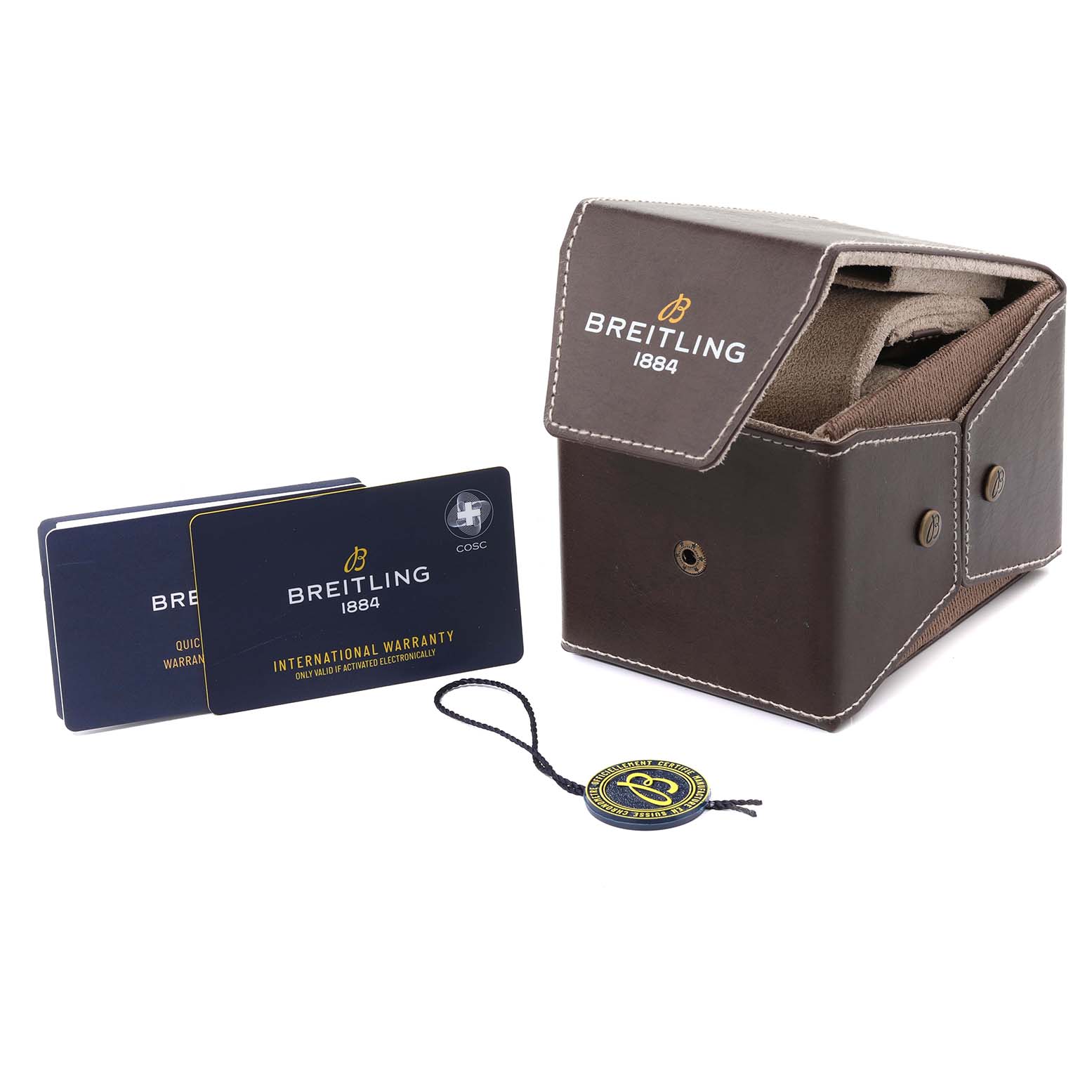 The image shows the packaging, warranty cards, and tag for a Breitling Navitimer RB12302A1L1P1 Men's Rose Gold Green Dial RB12302A1L1P1 Men's Rose Gold Green Dial watch.