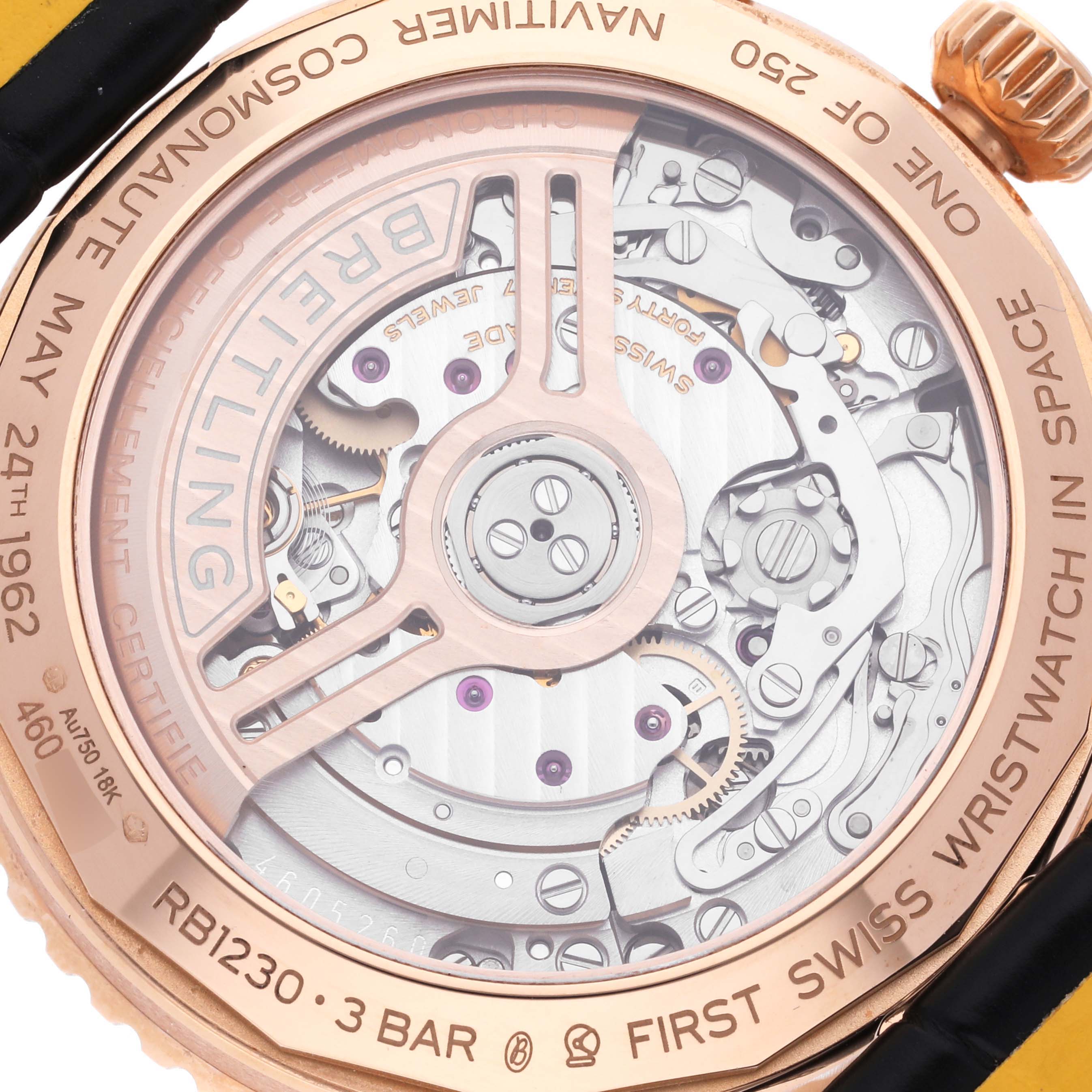 The image shows the back casing and internal mechanism of a Breitling Navitimer RB12302A1L1P1 Men's Rose Gold Green Dial RB12302A1L1P1 Men's Rose Gold Green Dial watch at a close-up angle.