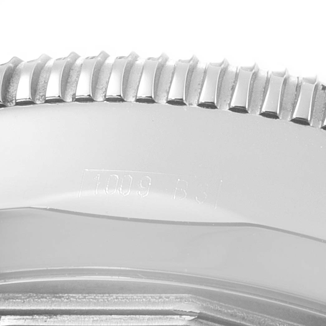 This image shows a close-up of the bezel’s edge and part of the casing of a Breitling Superocean A17320 Men's Stainless Steel Blue Dial A17320 Men's Stainless Steel Blue Dial watch.